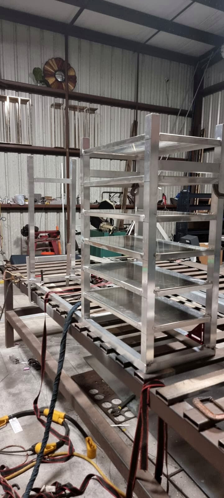 Custom rack fabrication in progress, Fine Edge Industries shop floor, Hallandale Beach