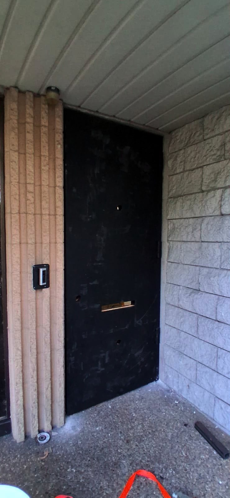 Custom heavy-duty steel door fabricated and installed by Fine Edge Industries at a commercial facility in Doral