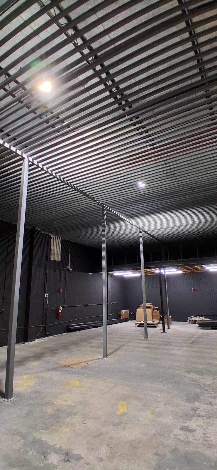 Structural steel mezzanine framing designed, engineered and fabricated by Fine Edge Industries, Doral FL