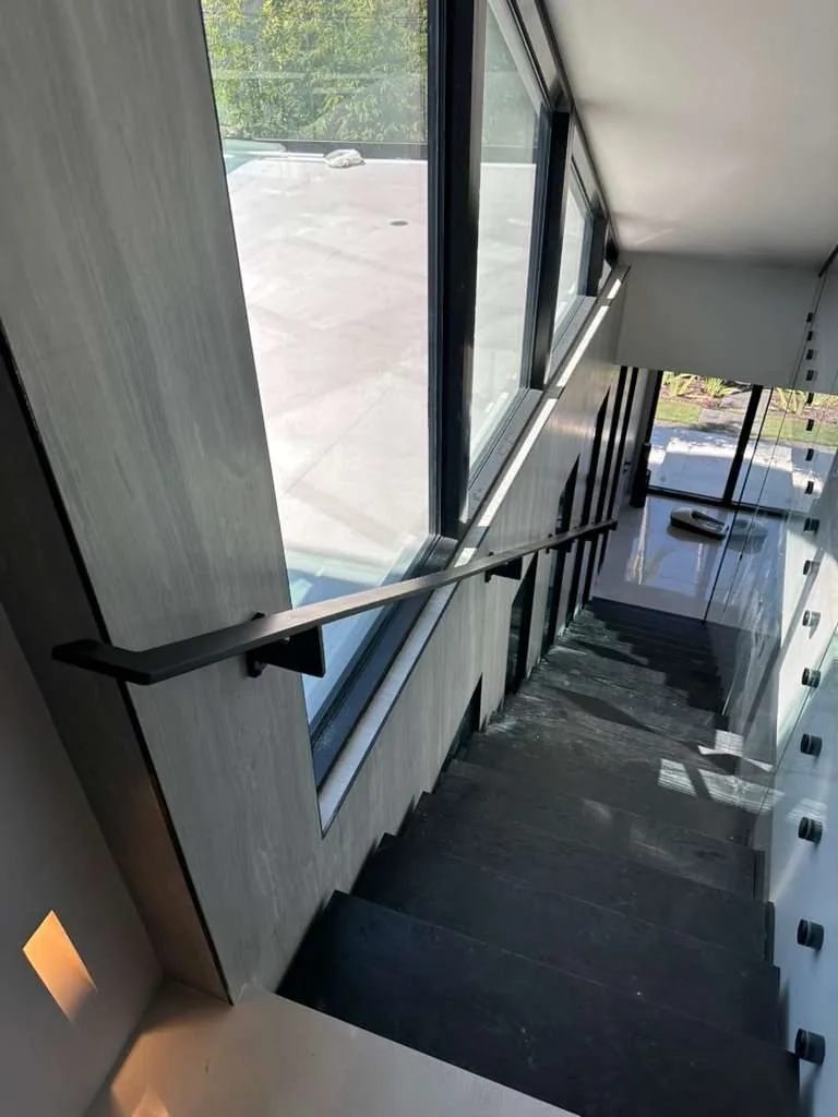 Code-compliant metal handrail, South Florida