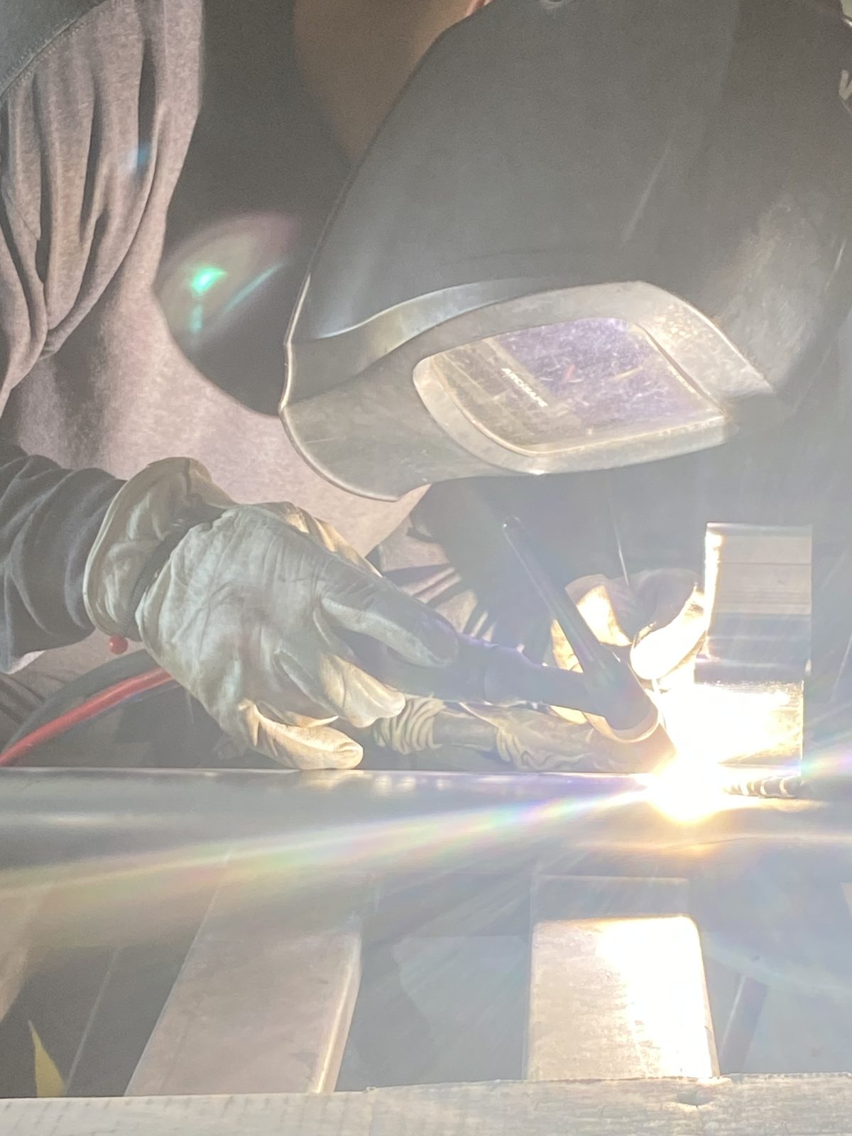 Fine Edge Industries welder performing on-site mobile welding, South Florida