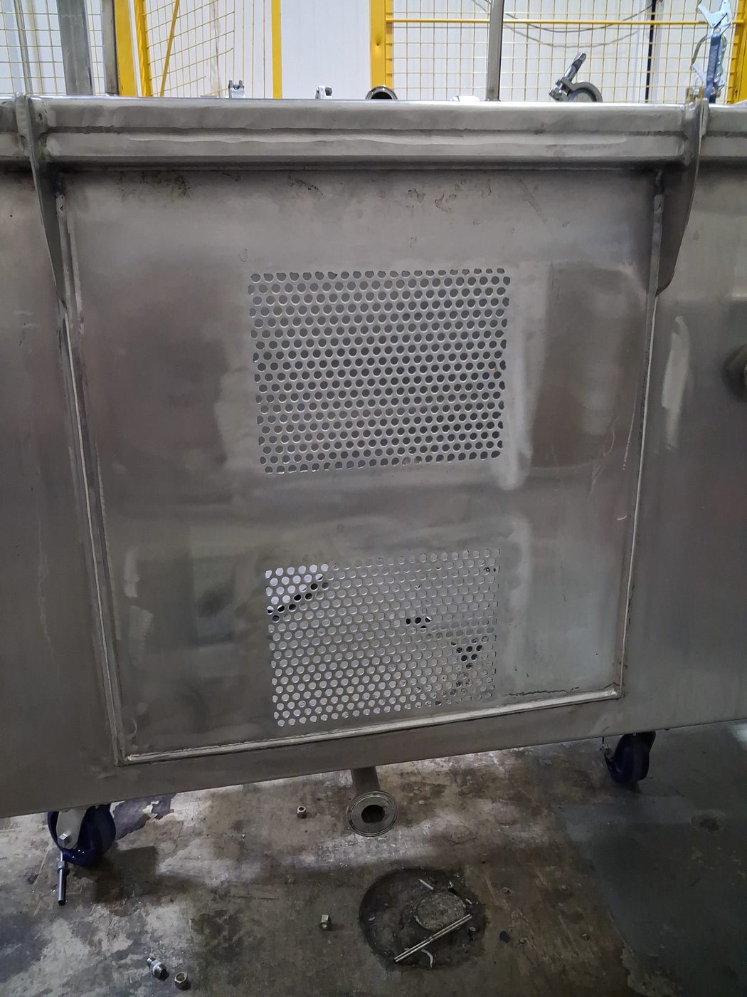 Stainless steel vat with custom perforated screening panels welded in, Pompano Beach food plant