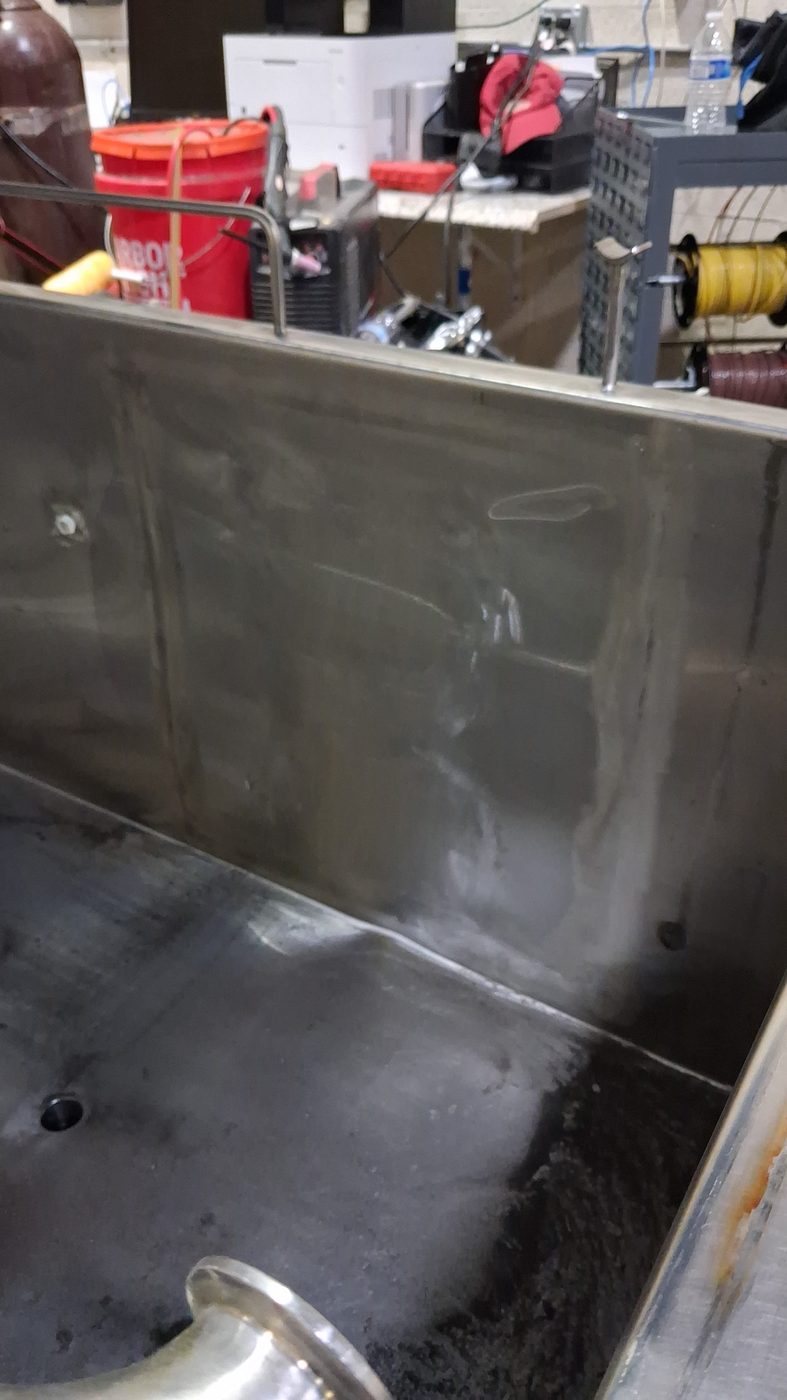 On-site mobile welding on a stainless processing trough, Pompano Beach food production line