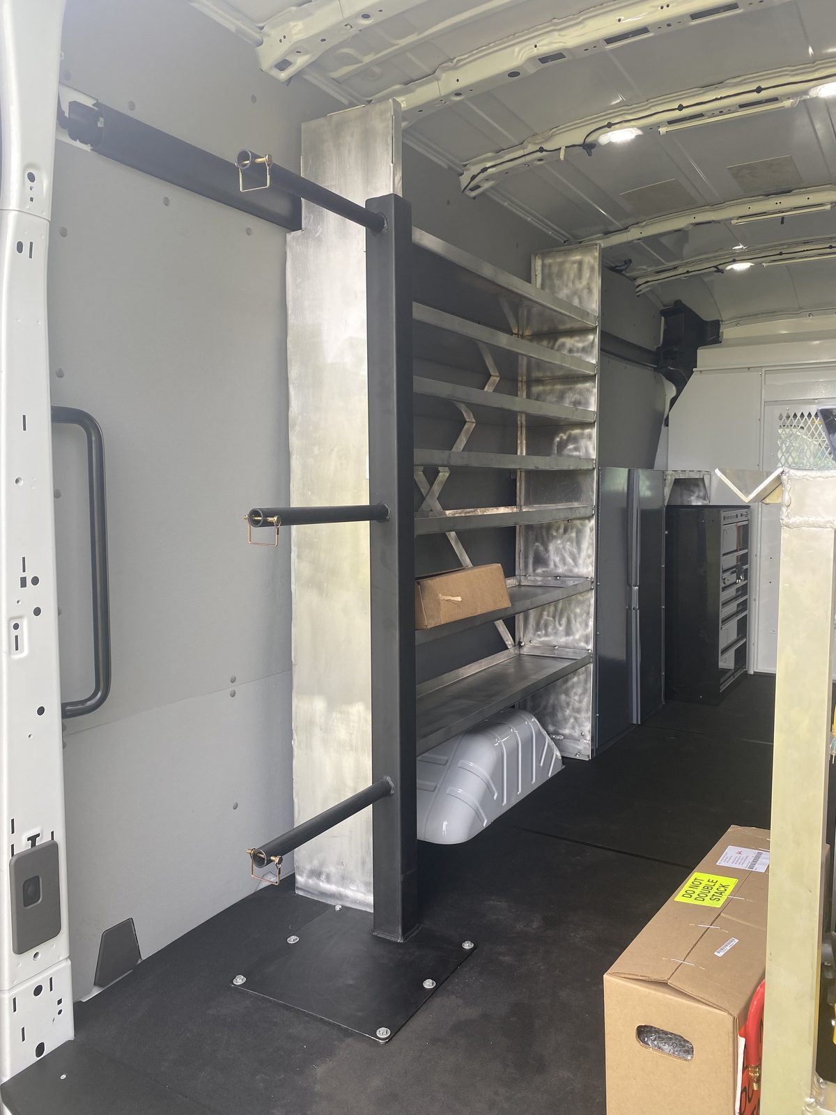 Custom van shelving system for South Florida contractor fleet